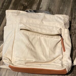 Cream and Tan Backpack with Front Pocket